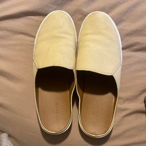 Slide on yellow shoes